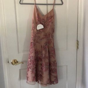 Floral lace nude dress.